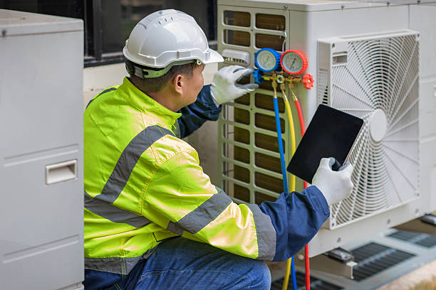 Professional Air Conditioning Repair technician working in Pescadero, CA